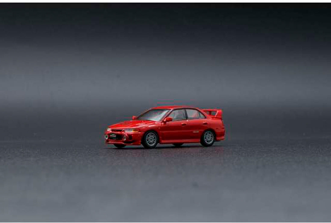 Mitsubishi Lancer Evolution IV (RHD) in Red