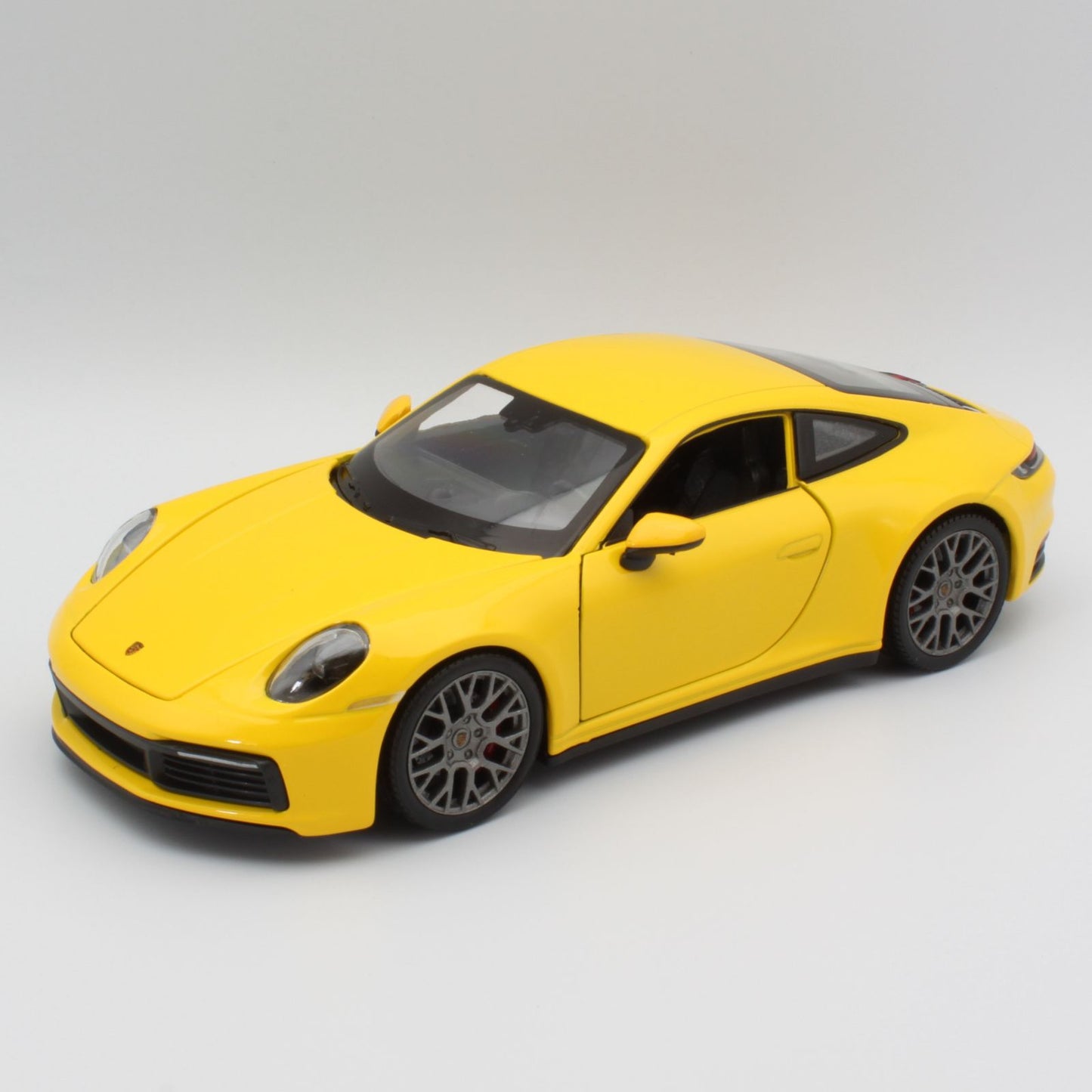 Porsche 911 Carrera 4S in yellow