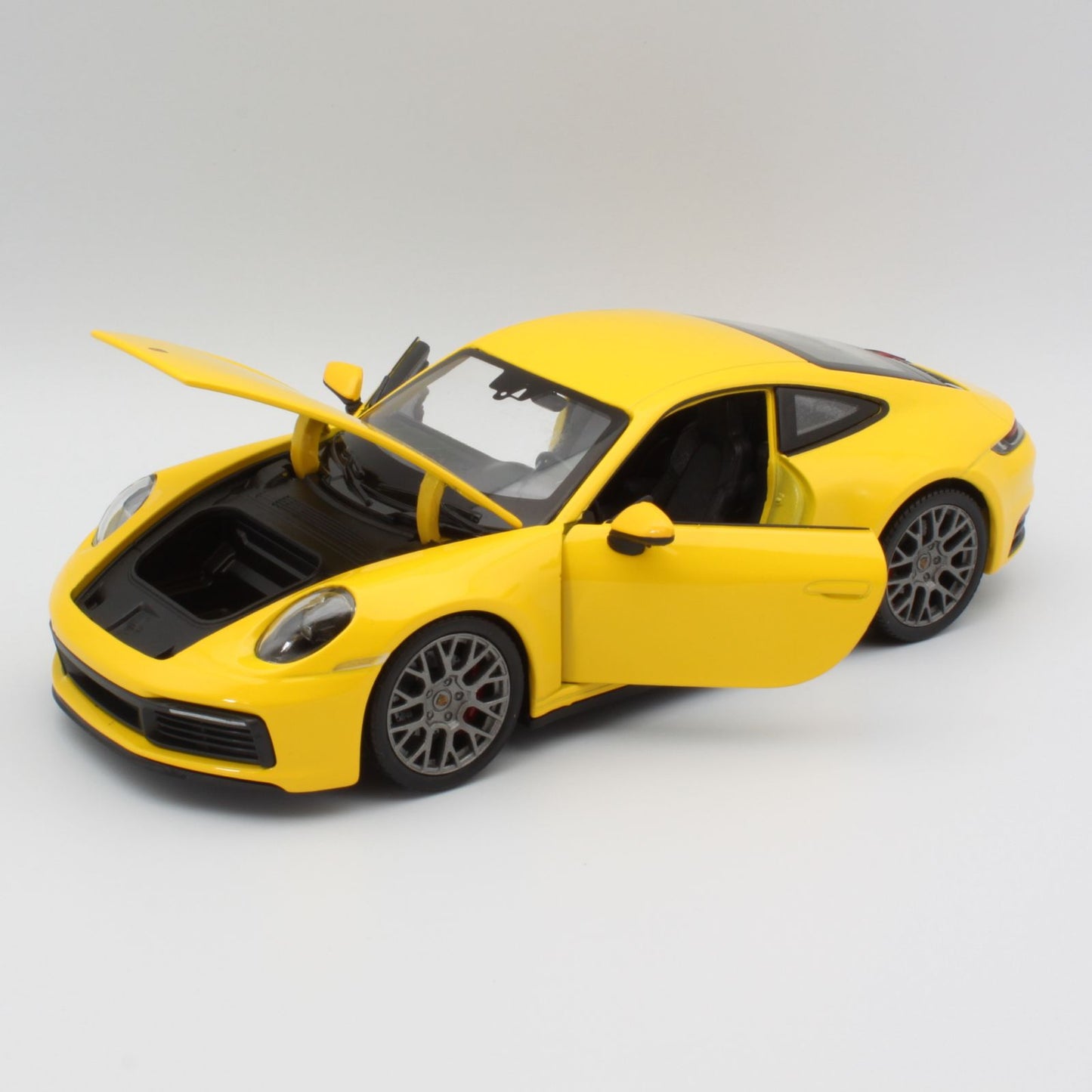 Porsche 911 Carrera 4S in yellow
