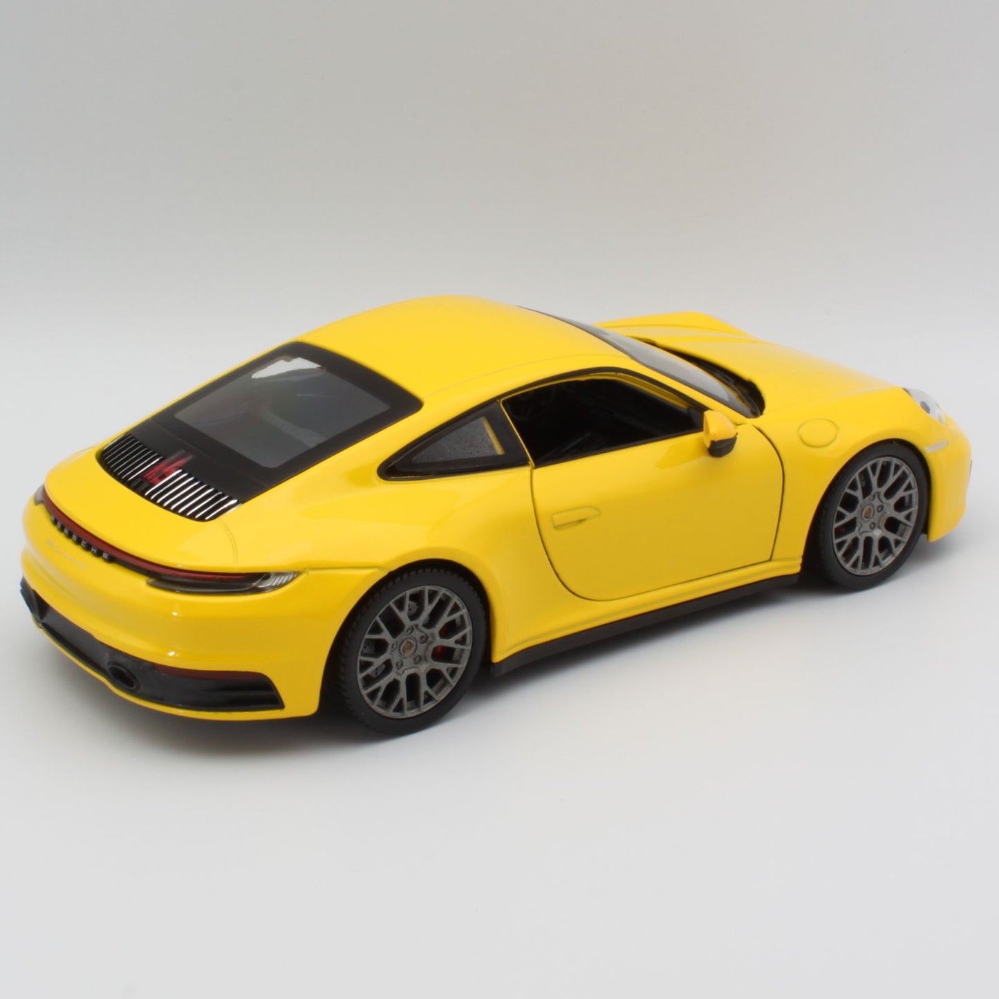 Porsche 911 Carrera 4S in yellow
