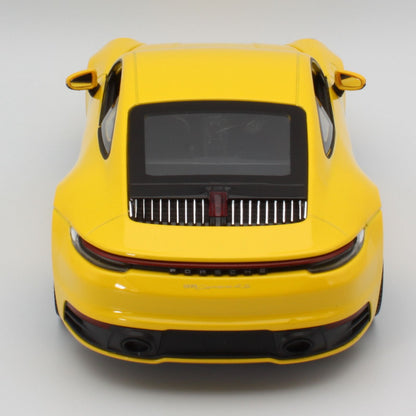 Porsche 911 Carrera 4S in yellow
